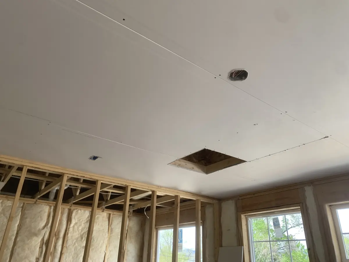 Newly hung and taped drywall ceiling in a new-construction home in Arvada, CO