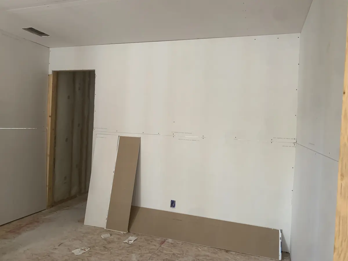 Drywall hung and taped on new-construction interior walls in Arvada, CO